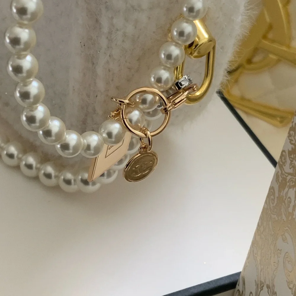 Chanel Pearl-Embellished Cream Bag